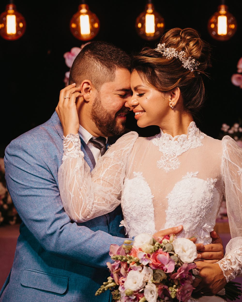 A couple sharing a quiet moment at their wedding
